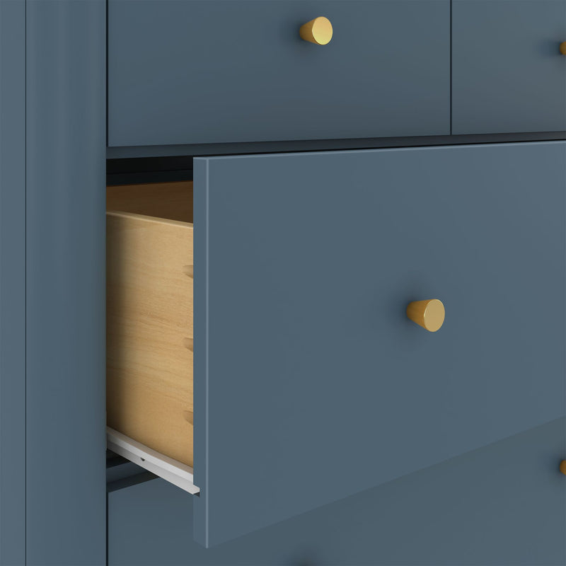 Close-up of modern matte blue cabinet drawers with gold round knobs and a partially open drawer revealing light wood interior