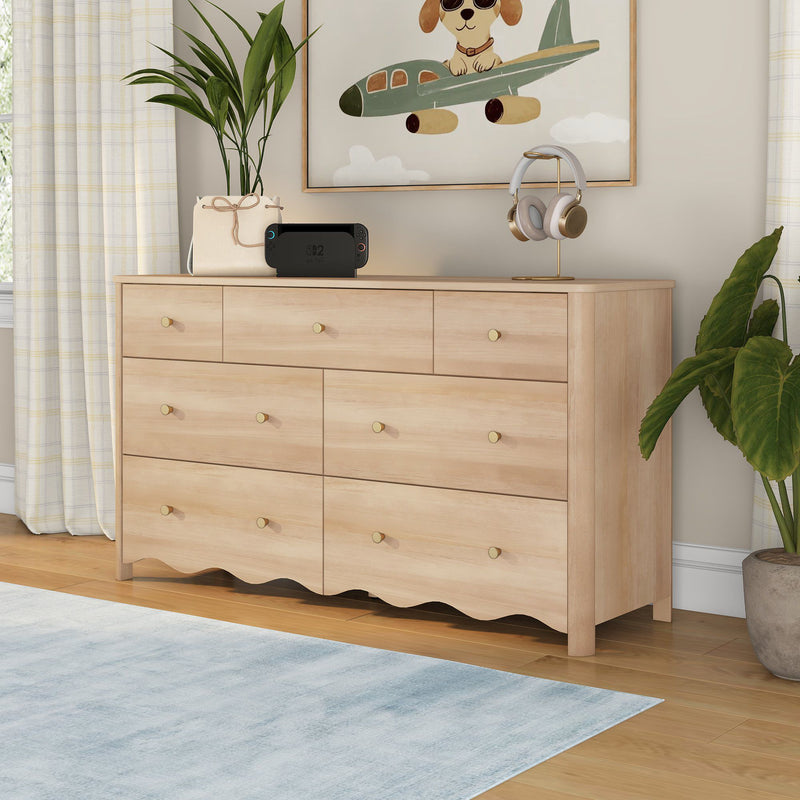 Light wood 6-drawer nursery dresser with brass knobs and scalloped base for kids bedroom storage