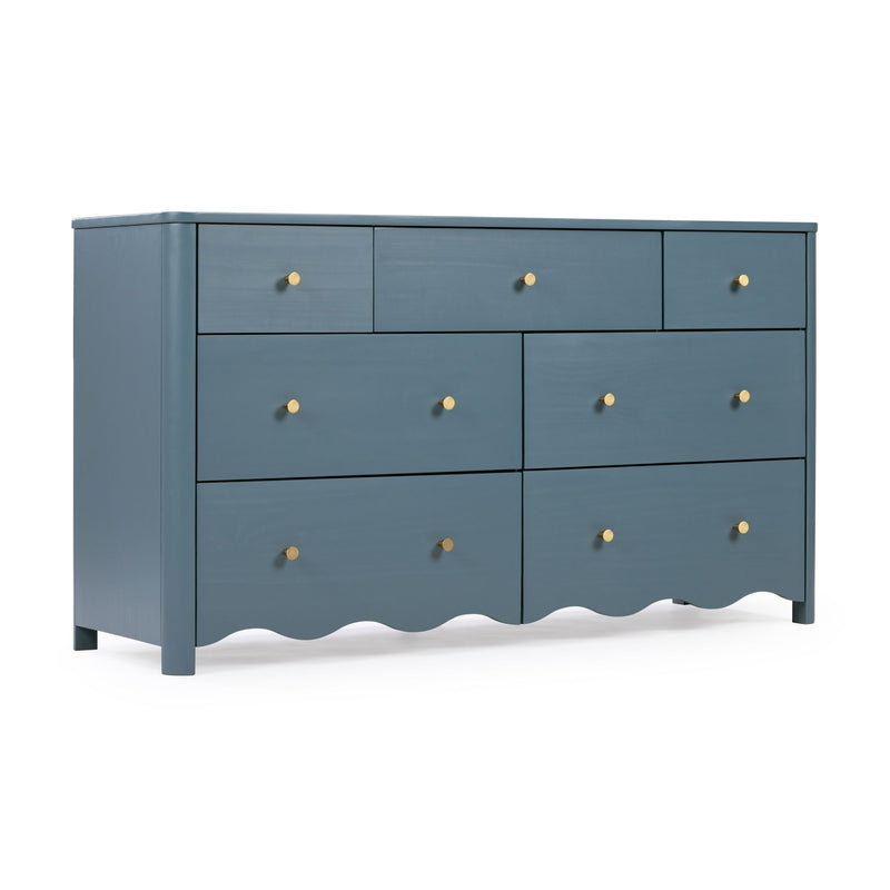 Blue painted wooden dresser with nine drawers and round brass knobs, bedroom storage furniture on white background
