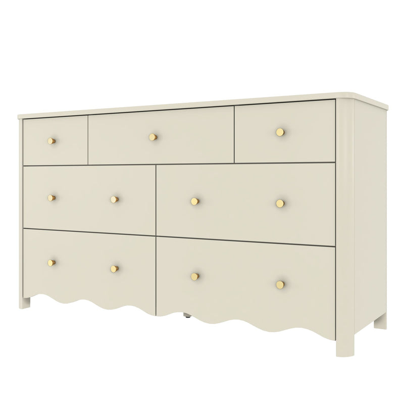 Cream painted wooden dresser with gold round knobs, scalloped bottom trim and multiple drawers for bedroom storage in modern farmhouse style