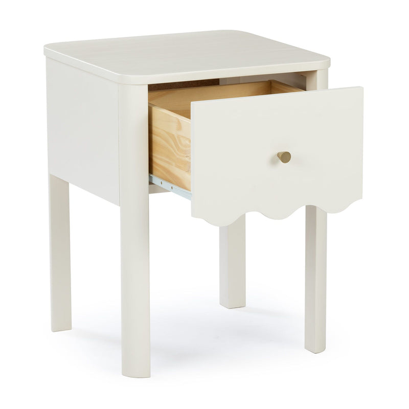White wooden nightstand bedside table with single open drawer showing natural wood interior, brass knob and scalloped apron