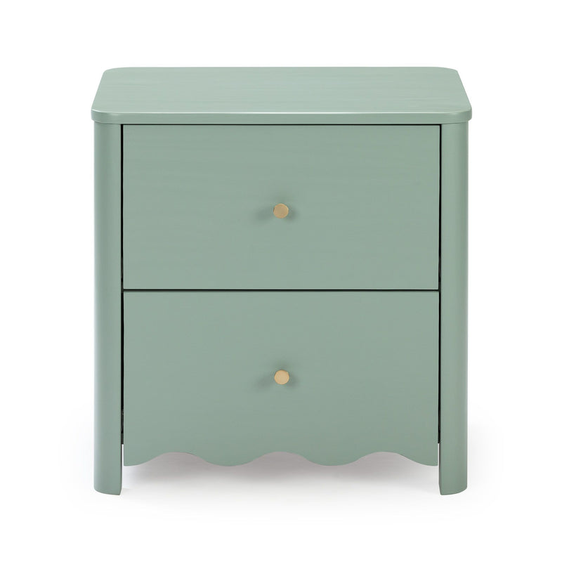 Sage green matte painted wooden bedside nightstand with two drawers, brass knob, rounded corners and scalloped apron, modern vintage bedroom table
