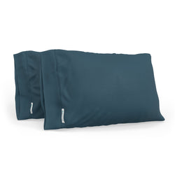 Dark blue luxury pillowcases set for a comfortable and stylish bedroom decor.