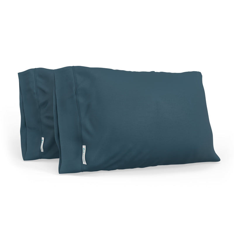 Dark blue luxury pillowcases set for a comfortable and stylish bedroom decor.