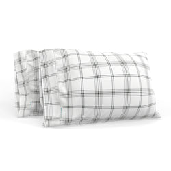 Plaid pillow covers in black and white checkered pattern for bedroom decor.