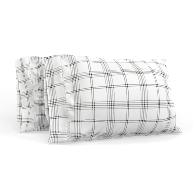 Plaid pillow covers in black and white checkered pattern for bedroom decor.