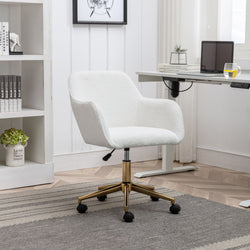 Modern white swivel office chair with gold base in stylish home office setting.
