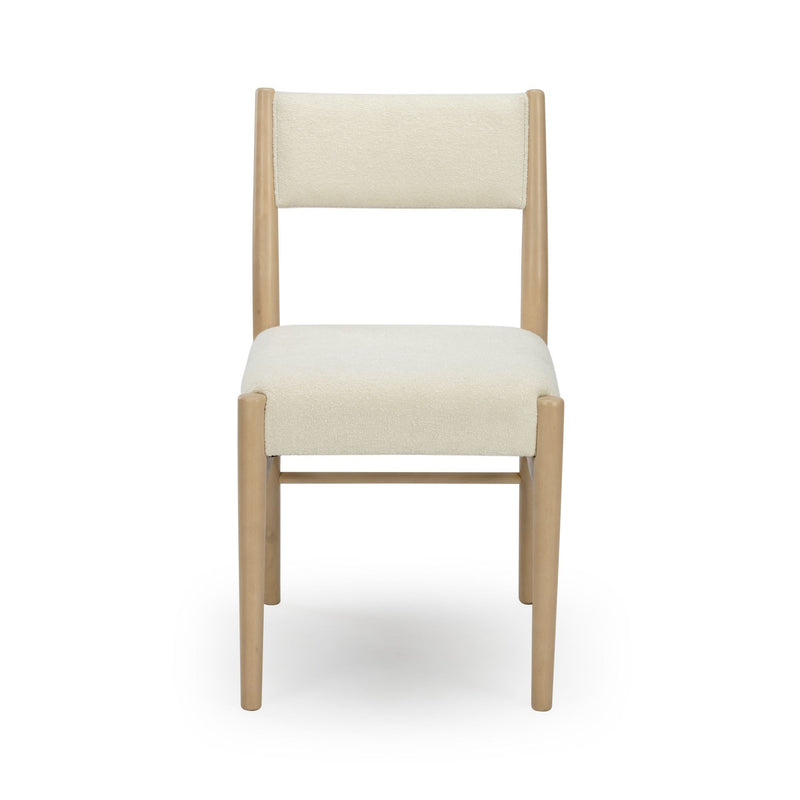 Front view of modern Scandinavian dining chair with cream bouclé upholstery, cushioned seat and back, light oak frame and tapered legs on white background