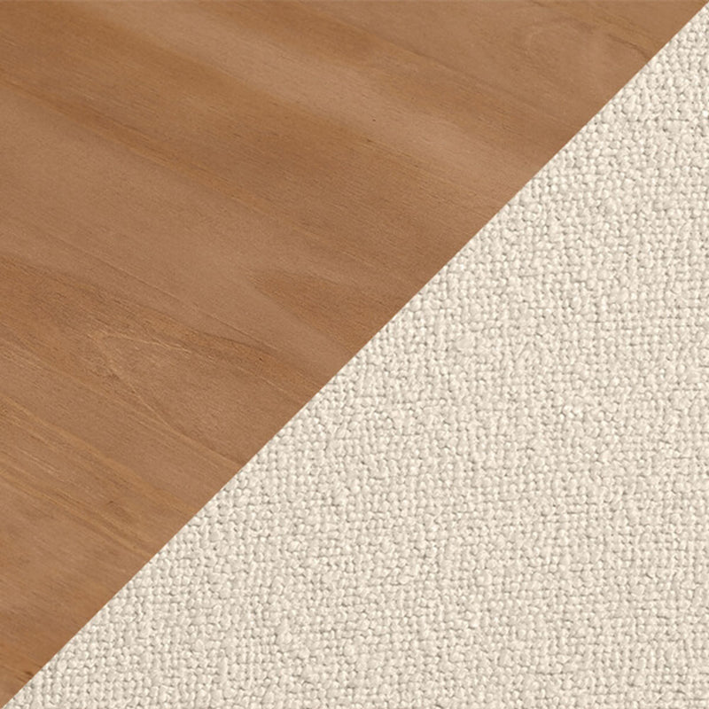 Diagonal close-up of light oak hardwood flooring meeting cream loop-pile carpet, showing wood and carpet flooring transition texture