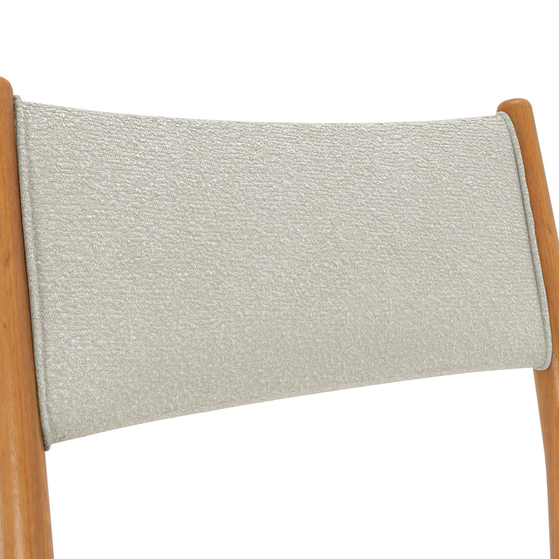 Close-up of modern wooden lounge chair back with light gray textured upholstery and exposed wood frame on white background