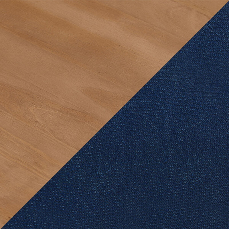 Diagonal transition between light oak wood flooring and textured navy blue carpet, close-up of flooring materials and textures