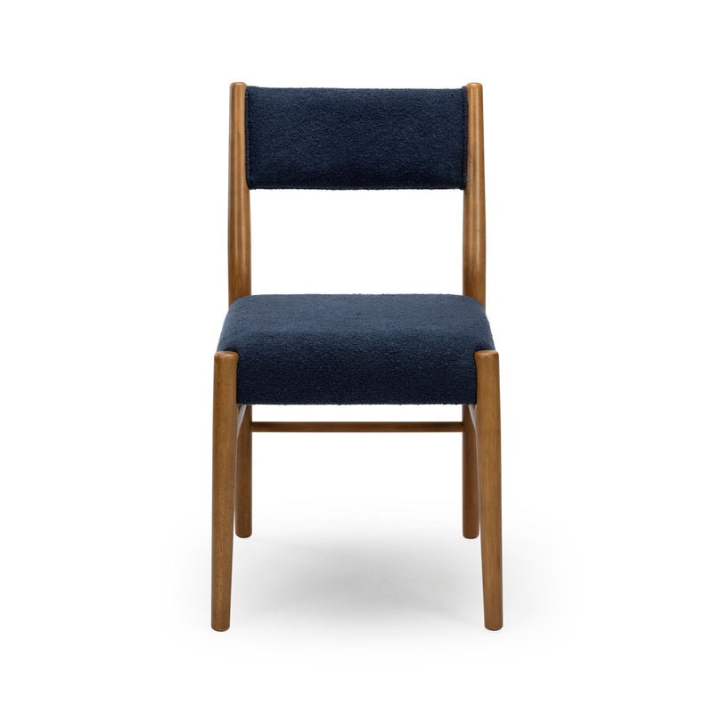 Front view of a mid-century modern navy blue upholstered dining chair with solid wood frame and cushioned seat and back on white background