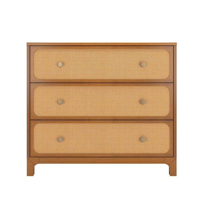 Mid-century modern three-drawer oak dresser with natural rattan cane fronts and round brass knobs, bedroom storage