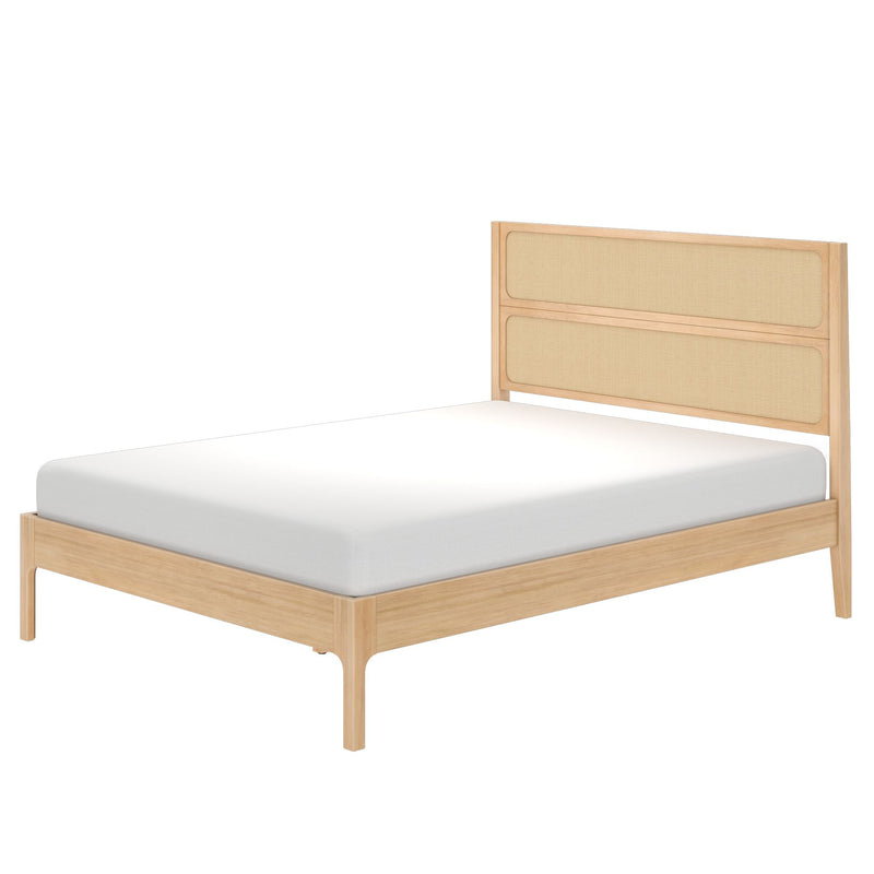 Light oak platform bed with woven cane headboard and white mattress — minimalist mid-century modern bedroom furniture