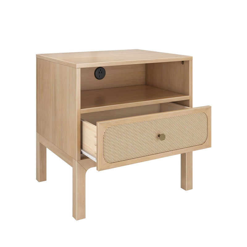 Light oak bedside table with woven rattan drawer front, open storage shelf and built-in power outlet with USB port