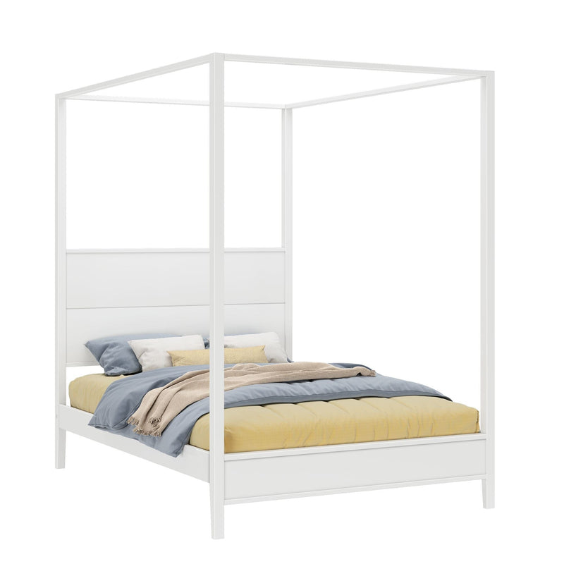 White four-poster canopy bed with paneled headboard and layered blue, yellow, and beige bedding — modern minimalist bedroom furniture