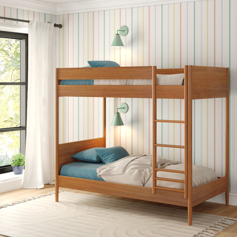 Modern wooden bunk bed with teal bedding and striped wall in bright, cozy bedroom.