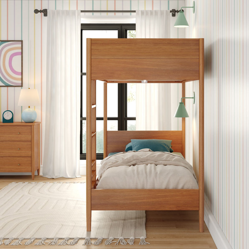 Modern wooden bunk bed in a stylish bedroom with minimalist decor and natural lighting.