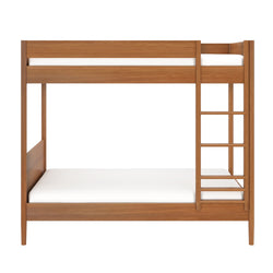 Wooden bunk bed with ladder and white mattresses, ideal for maximizing space in children's bedrooms.