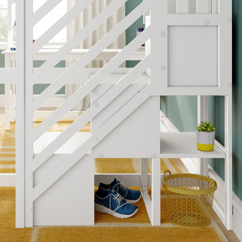 White wooden loft/bunk bed with diagonal railing, built-in desk and shelves, under-bed shoe storage with blue sneakers, yellow wire basket and potted succulent on mustard-striped rug