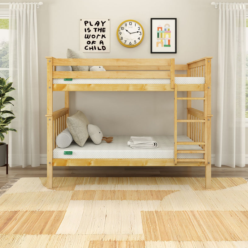 Natural pine twin-over-twin bunk bed with ladder in bright neutral children's bedroom, minimalist decor with mattresses, cushions and wall art