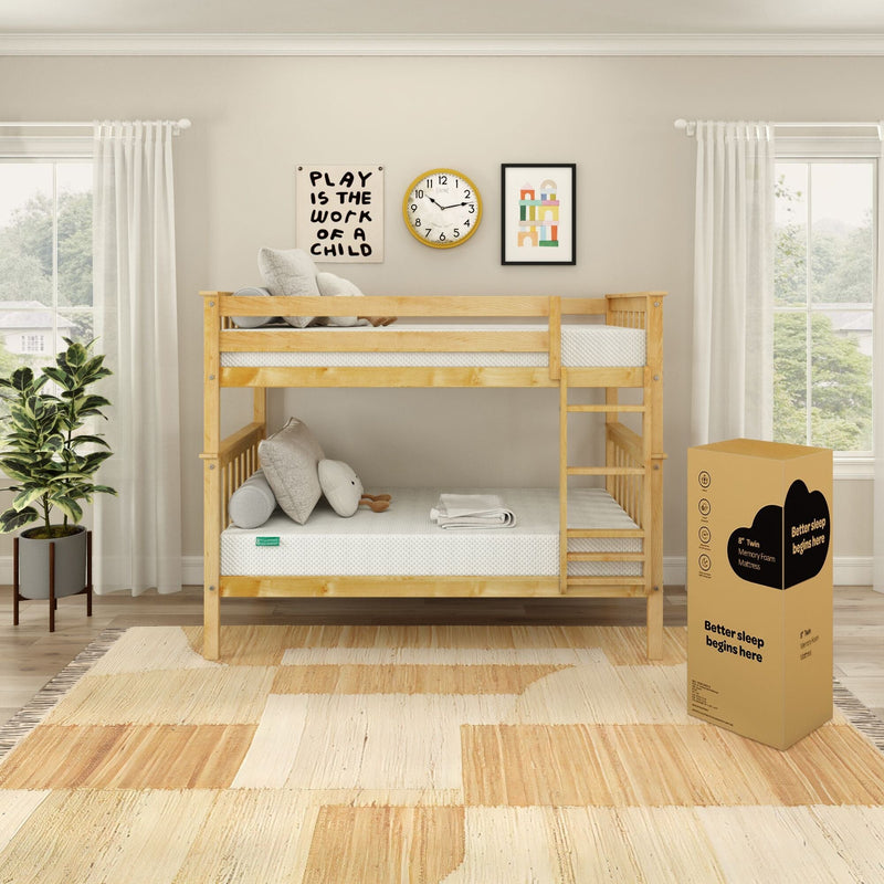 Natural wood twin bunk bed in bright kids' bedroom with boxed memory foam mattress, neutral decor, play-themed wall art and potted plant
