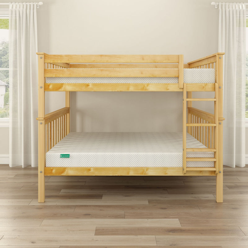 Natural wood bunk bed with ladder and white mattresses in a bright bedroom with hardwood floors and sheer white curtains