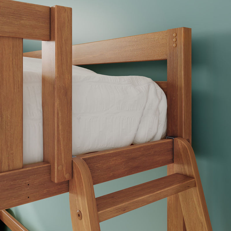 Close-up of solid wood bunk bed corner with ladder, white mattress and teal wall