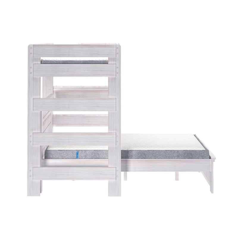 Whitewashed wooden twin-over-full bunk bed with slatted guardrails, farmhouse-style frame and gray mattress
