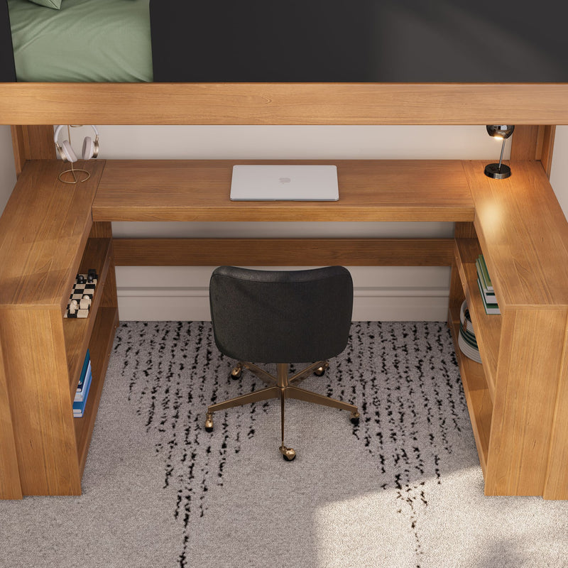 Under-loft built-in wooden desk workspace with closed laptop, over-ear headphones on a stand, chrome task lamp, black swivel chair and shelving — modern compact home office study nook.