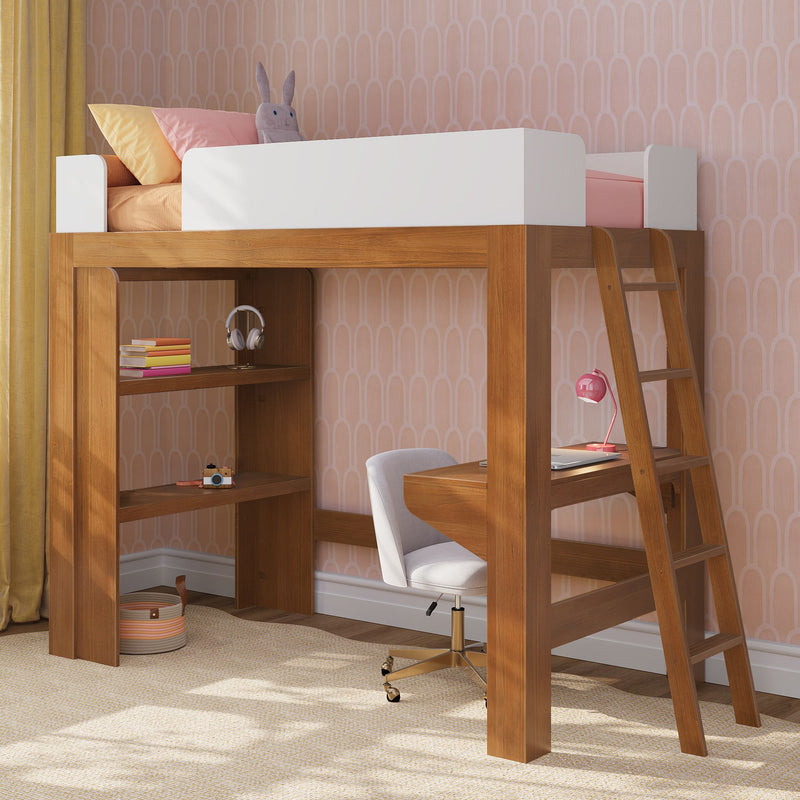 Kids loft bed with white guardrail and ladder, wooden built-in desk and shelves in a pink patterned children's bedroom with pastel bedding and study area