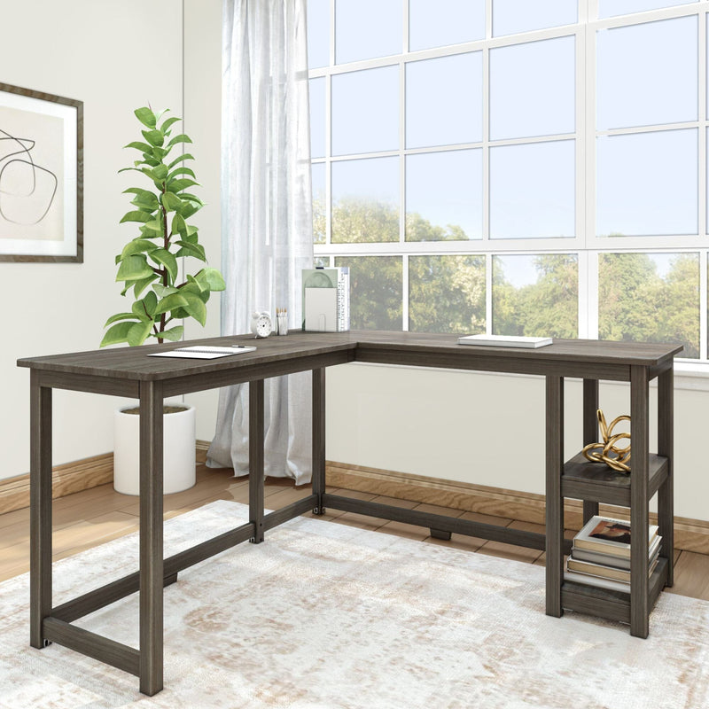 Modern dark wood L-shaped home office desk with open shelving, decorative accessories and potted plant by large window