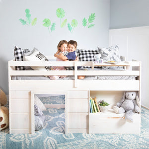 White low loft bed with underbed play area and shelf storage in spring room