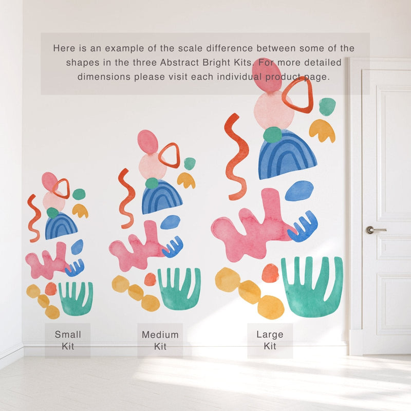 Scale comparison of small, medium and large Abstract Bright removable watercolor wall decals showing colorful shapes for nursery and kids' room decor