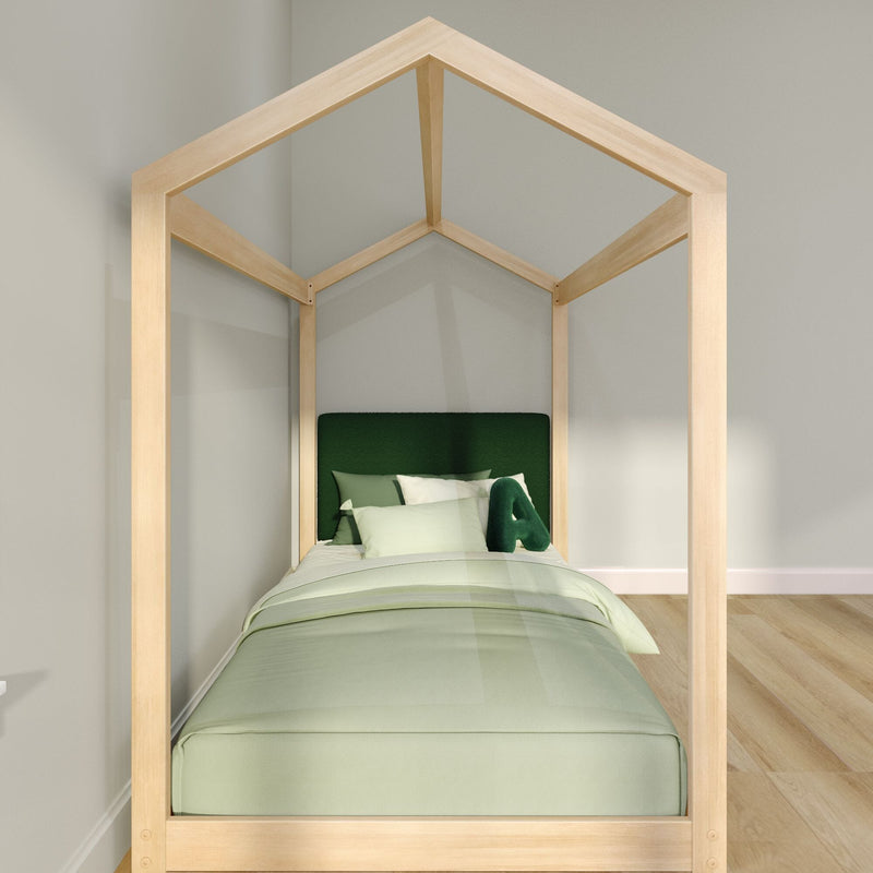 House-shaped wooden toddler bed with mint green duvet and forest green headboard in a minimalist children's bedroom with natural hardwood floor