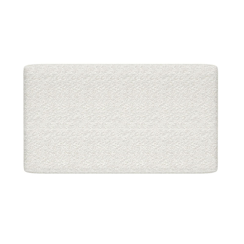 Top view of rectangular white textured mattress topper on white background, mattress pad bedding
