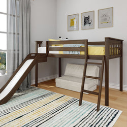 Dark walnut wooden kids loft bed with ladder and attached slide, yellow bedding and knit throw, sofa underneath in a modern children's bedroom with striped rug and framed cat art