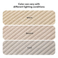 Beige plush ribbed towel swatches labeled Warm, Neutral, Cool under heading "Color can vary with different lighting conditions" showing lighting-dependent color variation