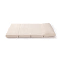 Beige corduroy tri-fold floor mattress, portable foldable futon mattress pad for guests and minimalist bedrooms
