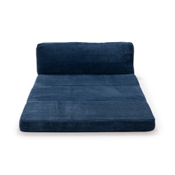 Navy blue floor sofa bed with plush cushions and modern design.