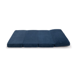 Blue folding floor mattress for versatile home use and guest comfort.