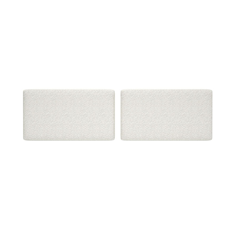 Set of two rectangular white bouclé sofa seat cushions with textured upholstery on white background
