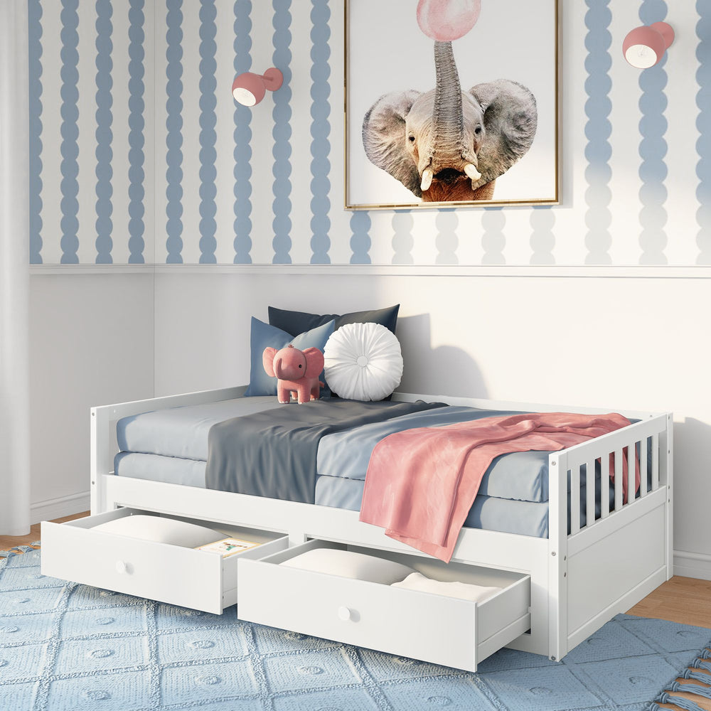 Children's room with white daybed, storage drawers, elephant decor, and pastel pink and blue accents.