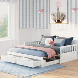 Children's bedroom with white daybed featuring storage drawers, decorative elephant pillow, pink blanket, and playful wall art.