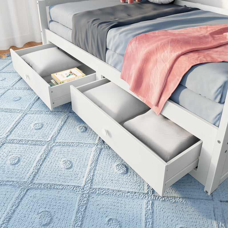 White bed with under-bed storage drawers on a blue patterned rug, featuring bedding and a pink blanket.