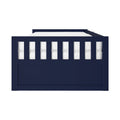 Navy blue wooden twin daybed with slatted guard rail and white mattress, modern kids' bedroom bed frame