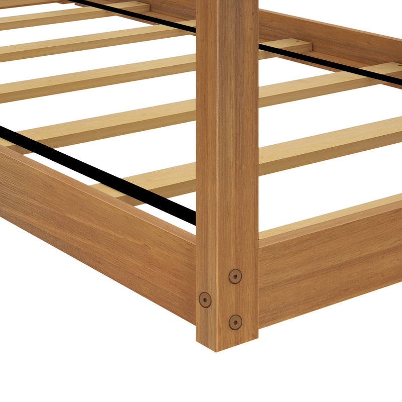 Wooden bed frame corner detail showcasing sturdy construction and wooden slats.