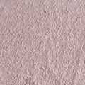 Close-up blush pink bouclé fabric texture — soft woven upholstery or carpet material