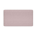Light pink textured fabric upholstered headboard with rounded corners on white background, modern minimalist bedroom decor
