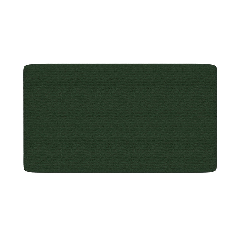 Dark green textured rectangular bath mat with rounded corners on white background
